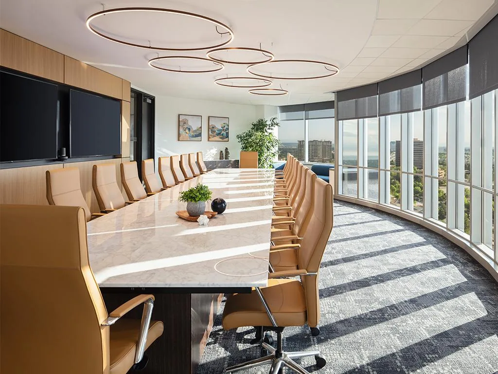 Clean corporate boardroom with ocean-view windows