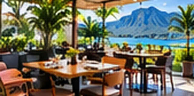 Outdoor restaurant patio seating with mountain views