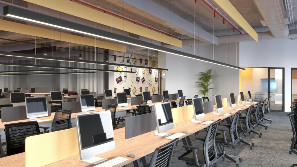 Clean modern office with computers and chairs